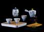 Дорожный набор для чайной церемонии  # 23520, фарфор: чайник 190 мл, четыре пиалы по 65 мл, чайница, чайная доска, щипцы, чайное полотенце, сумка для транспортировки набора.