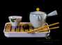 Travel kit for tea ceremony # 23518, porcelain: teapot 190 ml, four cups of 65 ml, teatray, tongs, tea towel, case for transportation.